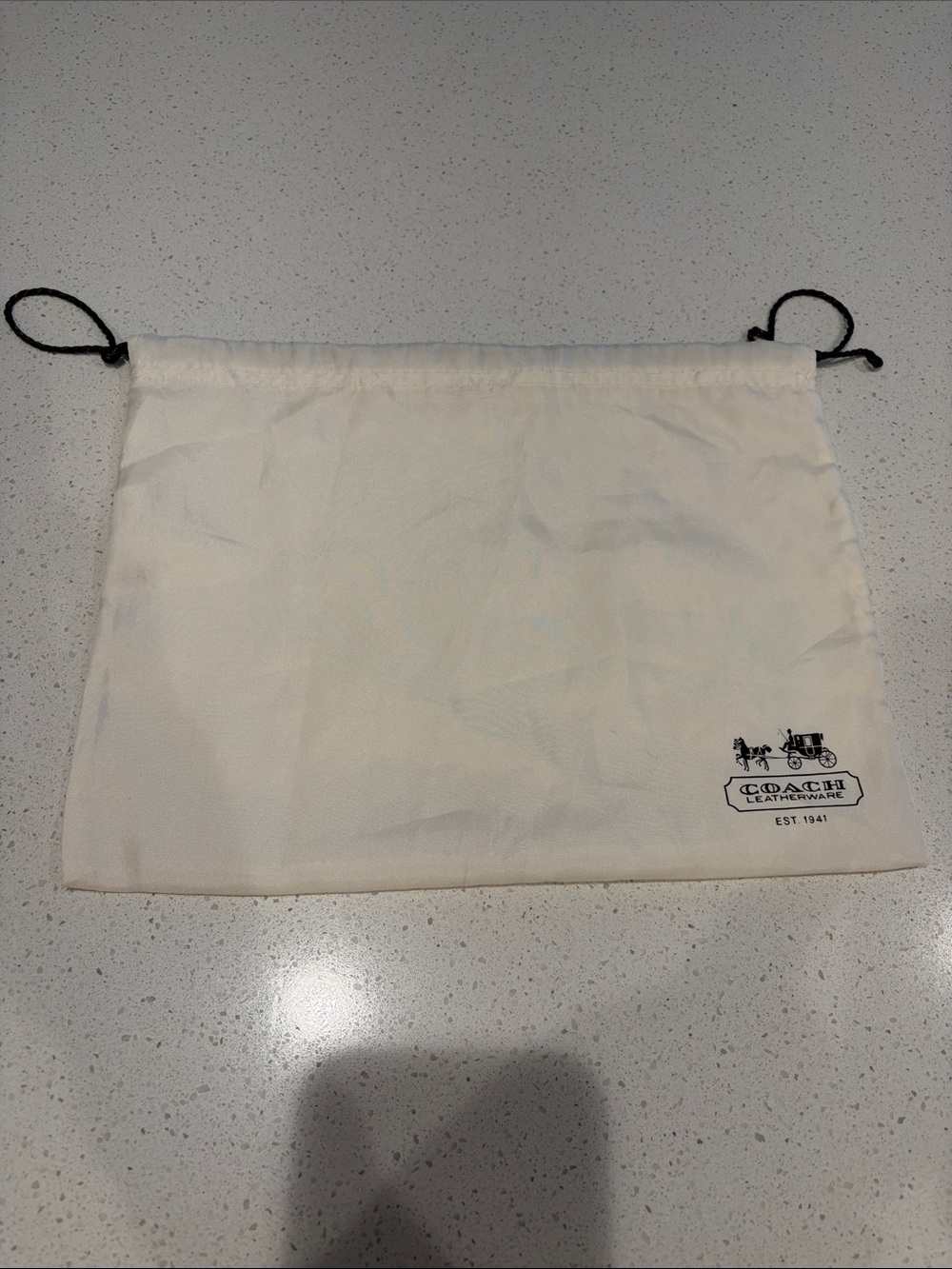 Coach Cream Drawstring Pouch with Black Logo